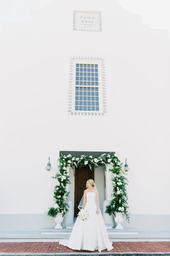 The bride in front of a door