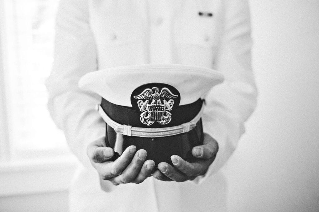 A black and white photo of a military hat