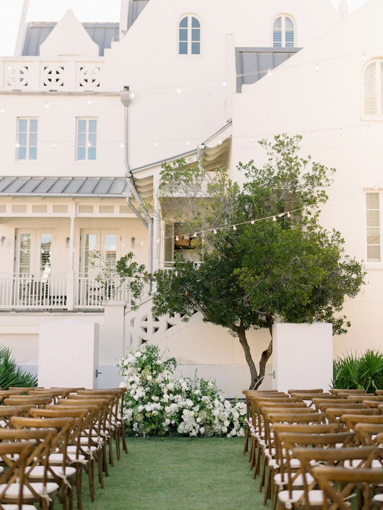 Ceremony setup with wooden chairs