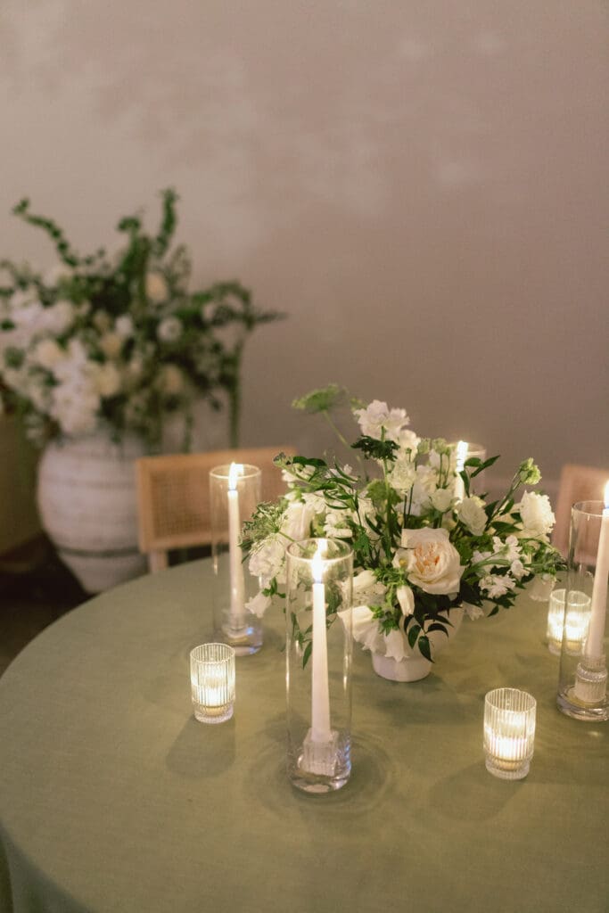 Table with candles and floral centerpiece